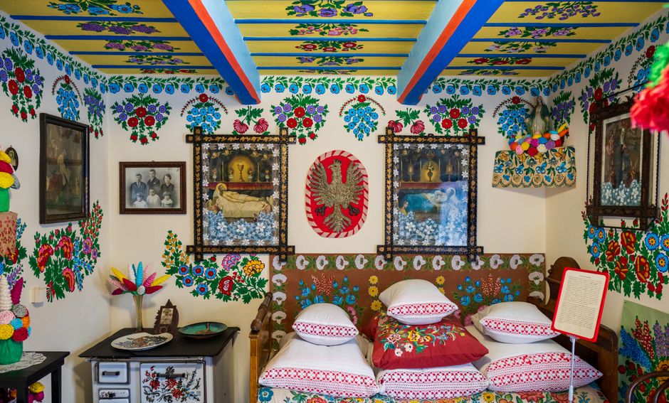 Vibrant interior with traditional Polish folk art decorations in Zalipie.